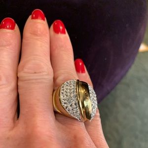 VINTAGE GOLD RING WITH RHINESTONES ABOUT A SIZE 7.